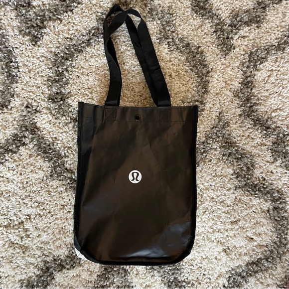 lululemon athletica Handbags - Lululemon small black‎ bag